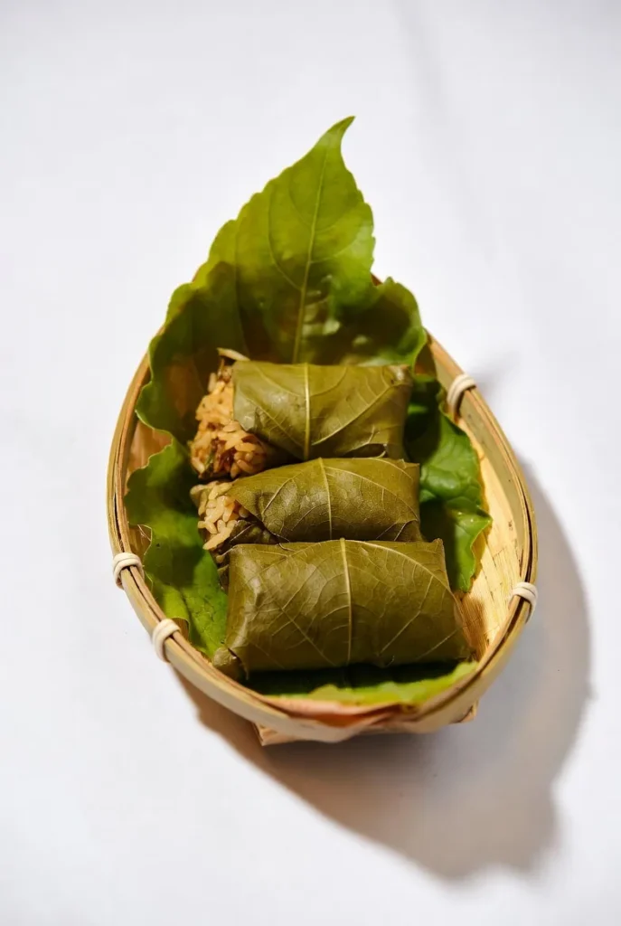 Vine Leaves in Bamboo Boat
